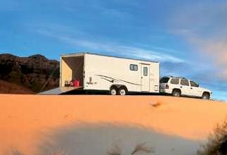 SUV hauling enclosed cargo trailer
