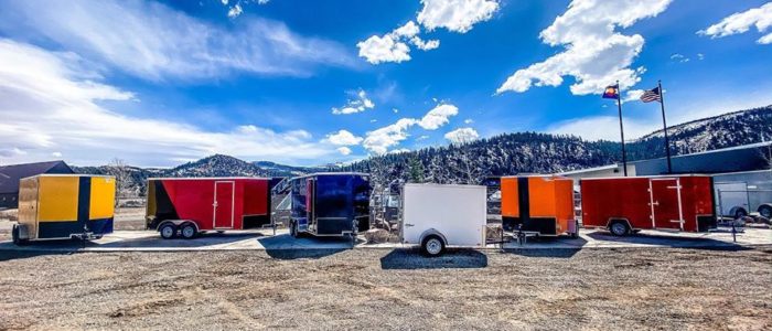 Pace American and Look Trailers Yellow, Red two tone, blue, white, and orange trailers