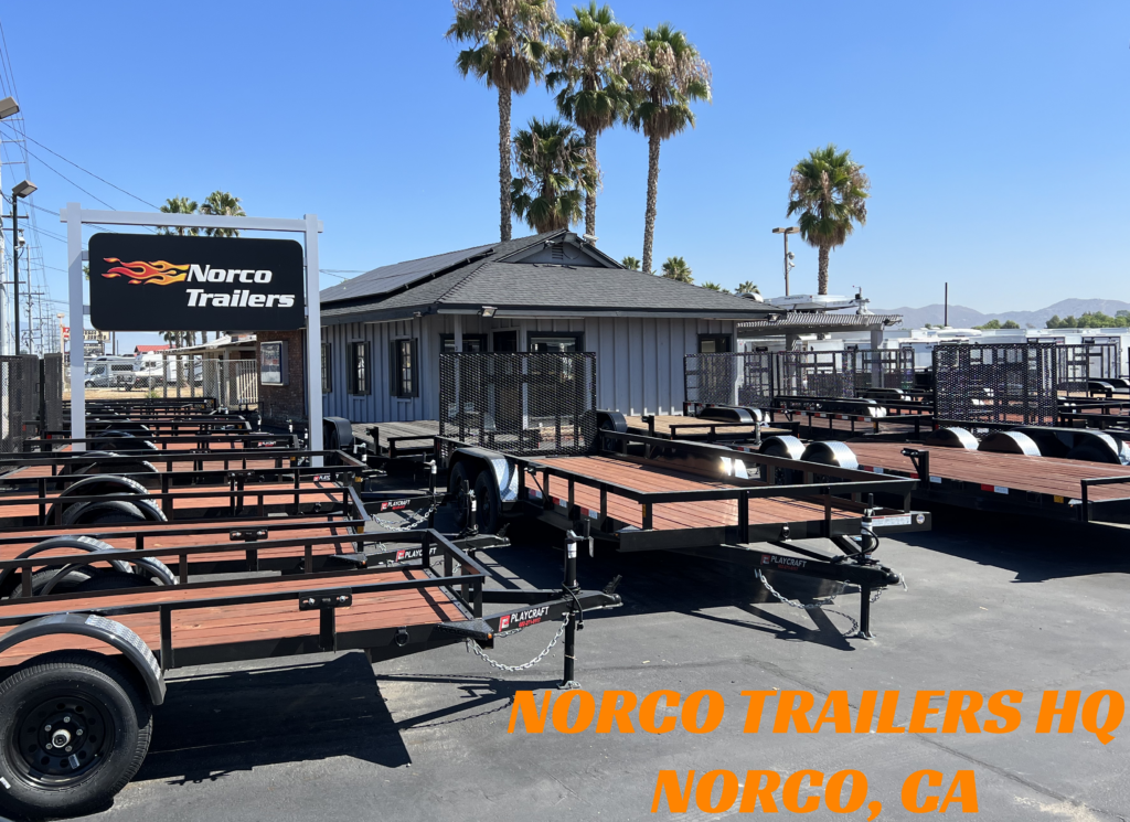 Text says Norco Trailers HQ Norco CA. Norco Trailers Norco CA Store entrance showing utility trailers and flatbed trailers